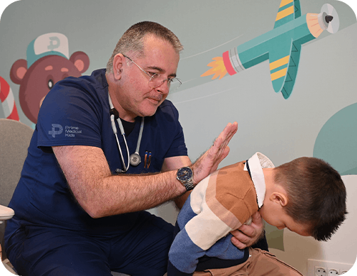 Dr Gabriel Vidovic examining patient